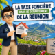 Illustration Fiscallia consacrée à la taxe foncière à La Réunion (974), avec la mascotte Fiscallia présentant l’imposition foncière dans le département sur fond de paysage réunionnais.